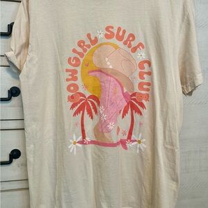 Women’s cream Cowgirl Surf Club Tshirt. Comfort Colors brand.